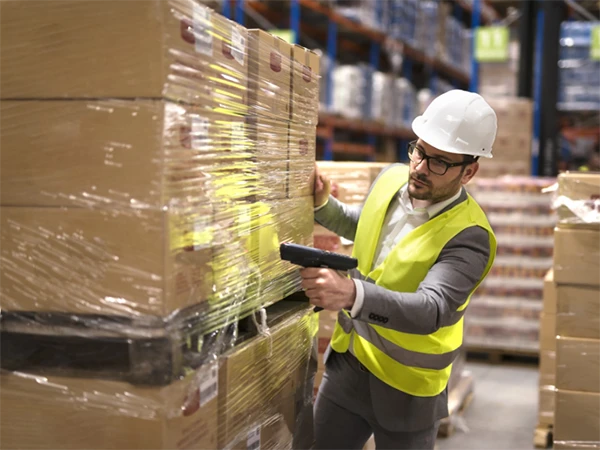 Quality inspectors scanning the product QR code to obtain complete product information