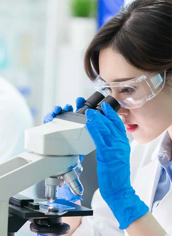 Researchers are using a microscope for observation