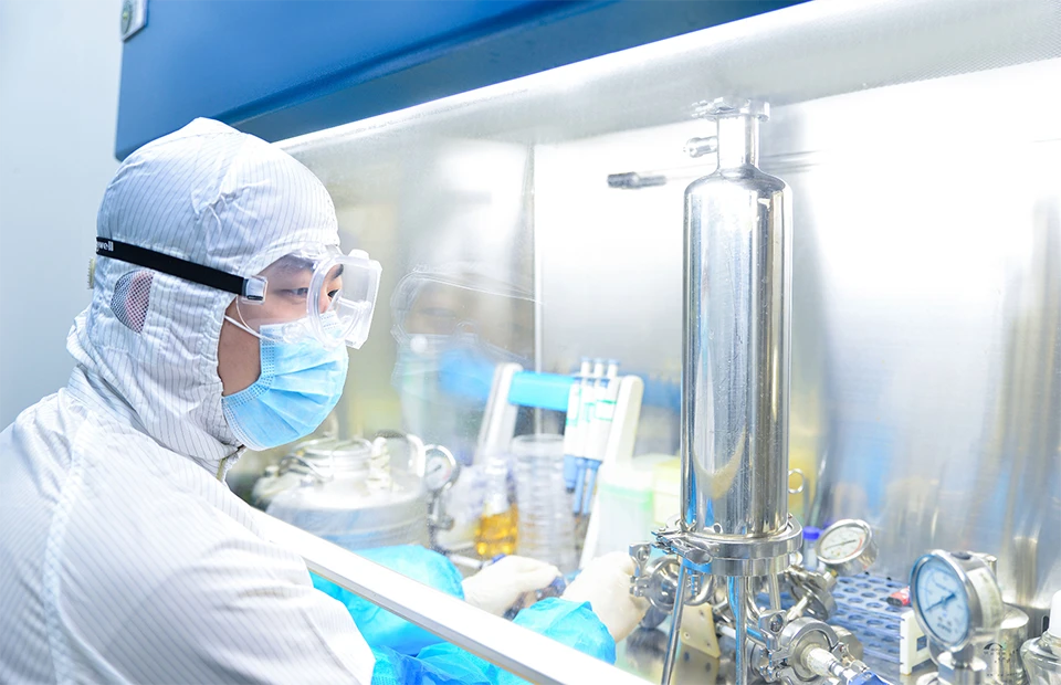 Testing personnel wearing protective clothing are testing the product performance