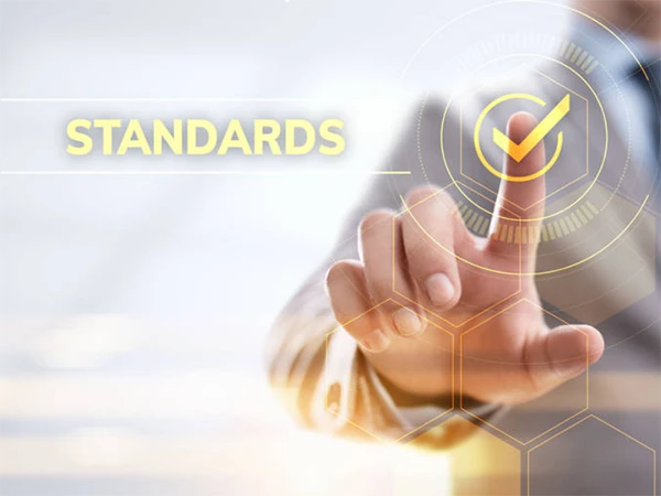 A hand pressing on the icon of testing and verification